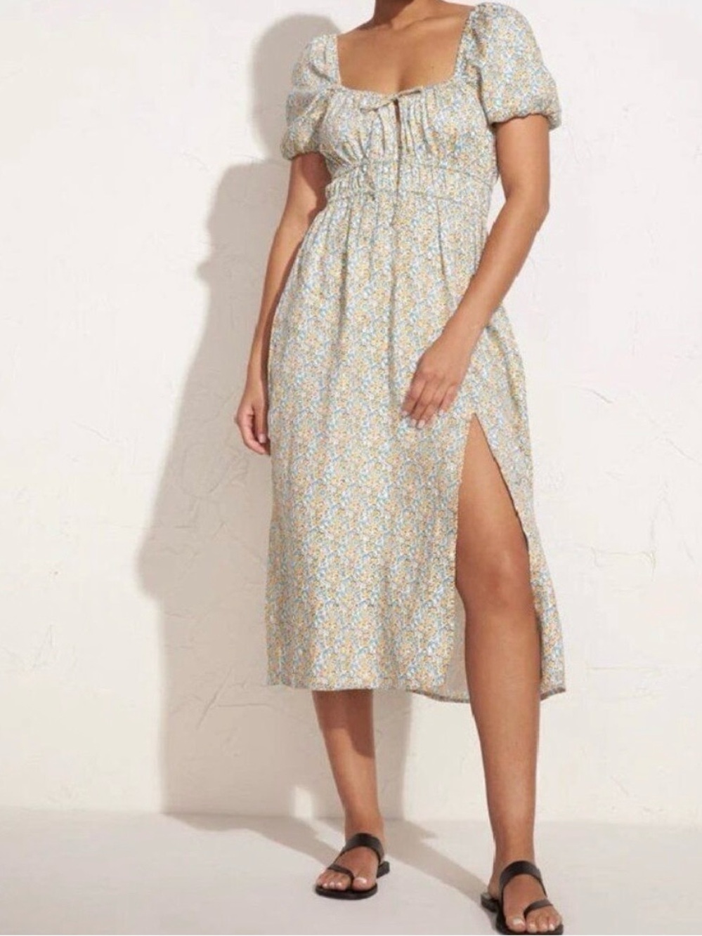 Faithfull the Brand Light Blue and Yellow Floral Maxi Dress with Puff Sleeves.